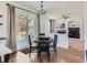 Bright dining area with access to backyard deck at 10141 Brady Pl, Highlands Ranch, CO 80130