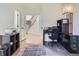 Home office with view of staircase and hardwood floors at 10141 Brady Pl, Highlands Ranch, CO 80130