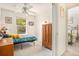 Bright bedroom with a view of the yard, closet and ceiling fan at 3300 W Florida Ave # 51, Denver, CO 80219