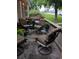 Inviting covered porch with comfortable seating, perfect for relaxing and enjoying the outdoors at 3300 W Florida Ave # 51, Denver, CO 80219