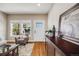 Welcoming entryway with hardwood floors, neutral paint, and stylish furnishings at 19294 E Warren Pl, Aurora, CO 80013