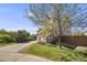 Charming home featuring a well-maintained front yard and a long driveway at 19294 E Warren Pl, Aurora, CO 80013