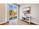 Bright living area with sliding glass doors to the backyard and a decorative console table at 19294 E Warren Pl, Aurora, CO 80013