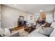 Spacious living room with hardwood floors, neutral walls, and elegant furnishings at 19294 E Warren Pl, Aurora, CO 80013