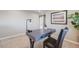 Home office featuring a stylish desk, comfortable chair, and minimalist decor at 19294 E Warren Pl, Aurora, CO 80013