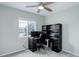 Bedroom with desk and black furnishings at 20626 Willowbend Ln, Parker, CO 80138