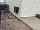 Home exterior with stone path leading to back deck and side yard at 20626 Willowbend Ln, Parker, CO 80138