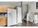 Spacious kitchen featuring stainless appliances, tile countertops and convenient refrigerator at 20626 Willowbend Ln, Parker, CO 80138