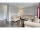Comfortable living room with hardwood floors and neutral furniture at 20626 Willowbend Ln, Parker, CO 80138