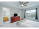 Main bedroom features en suite bath, ceiling fan and plush carpet at 20626 Willowbend Ln, Parker, CO 80138