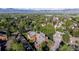 Overhead view of condo community surrounded by lush trees, ample parking, and well-maintained landscaping at 6110 Habitat Dr # 2, Boulder, CO 80301