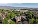 Scenic aerial view of a condo community with mountain and lake views, close to schools and local amenities at 6110 Habitat Dr # 2, Boulder, CO 80301