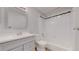Clean and functional bathroom with a white vanity, tub, white subway tile surround, and modern fixtures at 6110 Habitat Dr # 2, Boulder, CO 80301