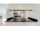 Bright kitchen featuring granite countertops, modern appliances, and an open view to the living area at 6110 Habitat Dr # 2, Boulder, CO 80301