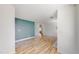 Spacious living room with wood-style floors and bright walls at 6110 Habitat Dr # 2, Boulder, CO 80301