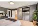 Stylish bedroom features a custom closet with integrated TV and built-in storage solutions at 785 Fillmore St, Denver, CO 80206