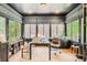 Bright home office with large windows, custom shades, and ample workspace, perfect for productivity at 785 Fillmore St, Denver, CO 80206