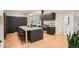 Spacious kitchen with a large island, stainless steel appliances, and ample counter space for cooking at 785 Fillmore St, Denver, CO 80206