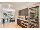 Modern kitchen with sleek cabinetry, built-in appliances, and a wine fridge, perfect for entertaining guests at 785 Fillmore St, Denver, CO 80206