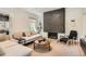 Bright living room featuring a modern fireplace, comfortable sofa and stylish decor creating an inviting space at 785 Fillmore St, Denver, CO 80206