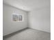 Neutral bedroom with gray carpet and a window providing natural light at 3398 Wadsworth Blvd, Wheat Ridge, CO 80033