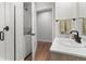 Bathroom featuring modern vanity and fixtures, a glass enclosed shower, and a washer/dryer at 2152 Bighorn Rd # 103, Georgetown, CO 80444