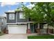 Charming two-story home with a two-car garage and covered front porch at 517 Sylvestor Trl, Highlands Ranch, CO 80129