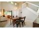 Bright living room with soaring ceilings and views of the yard at 517 Sylvestor Trl, Highlands Ranch, CO 80129