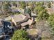 A charming home with mature trees in a well-kept neighborhood with city views beyond at 5106 S Kenton Way, Greenwood Village, CO 80111