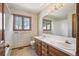Bathroom with vanity and window view at 5106 S Kenton Way, Greenwood Village, CO 80111