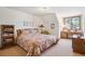 Bedroom with white walls, desk and window view at 5106 S Kenton Way, Greenwood Village, CO 80111