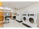 On-site laundry room facility for residents with multiple machines at 775 S Alton Way # 3C, Denver, CO 80247