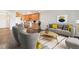 Bright, open-concept living space featuring hardwood floors and contemporary furnishings at 775 S Alton Way # 3C, Denver, CO 80247