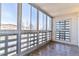 Bright sunroom with windows all around and light ceramic tile flooring at 775 S Alton Way # 3C, Denver, CO 80247