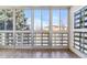 Enclosed patio with multiple large windows allowing for ample natural light and views at 775 S Alton Way # 3C, Denver, CO 80247