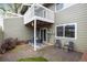 Inviting backyard with a patio, sliding glass doors, and lots of space for outdoor activities at 2976 Eagle Way, Boulder, CO 80301