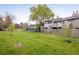 Backyard of townhomes with large grassy areas at 2976 Eagle Way, Boulder, CO 80301