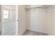 Walk-in closet with carpeted floor and basic shelving providing ample storage space at 2237 Garden Ave, Brighton, CO 80601