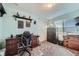 Bright bedroom featuring a functional desk and storage solutions at 11462 Iola St, Commerce City, CO 80640