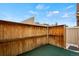 Cozy backyard with private fencing, offering a perfect outdoor space for relaxing and entertaining at 3300 W Florida Ave # 36, Denver, CO 80219