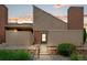 Charming townhouse featuring a unique architecture, a well-maintained walkway and some beautiful landscaping at 3300 W Florida Ave # 36, Denver, CO 80219