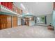 Spacious living room with vaulted ceilings, a loft area, and large windows that provide natural light at 3300 W Florida Ave # 36, Denver, CO 80219