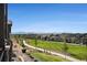 Community backyard featuring manicured grass, walking paths, and mountain views at 811 W 128Th Pl, Westminster, CO 80234