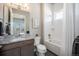 Charming bathroom with granite countertops, modern fixtures, and a soaking tub at 811 W 128Th Pl, Westminster, CO 80234