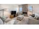 Inviting living area with a sleek fireplace, comfortable seating, and a warm atmosphere, perfect for relaxation at 811 W 128Th Pl, Westminster, CO 80234