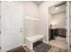 Mud room features a bench, coat hooks, and a convenient laundry area at 811 W 128Th Pl, Westminster, CO 80234
