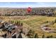 Aerial view of the home in a community near a green space, playground, and walking paths at 16135 Rock Crystal Dr, Parker, CO 80134