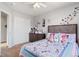 Bright bedroom with a decorative headboard and charming decor accents at 16135 Rock Crystal Dr, Parker, CO 80134