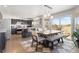 Kitchen with a dining table, bar seating, and sliding glass doors to the deck at 16135 Rock Crystal Dr, Parker, CO 80134