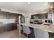 Updated kitchen boasts granite counters, stainless steel appliances, and a stylish backsplash at 16135 Rock Crystal Dr, Parker, CO 80134